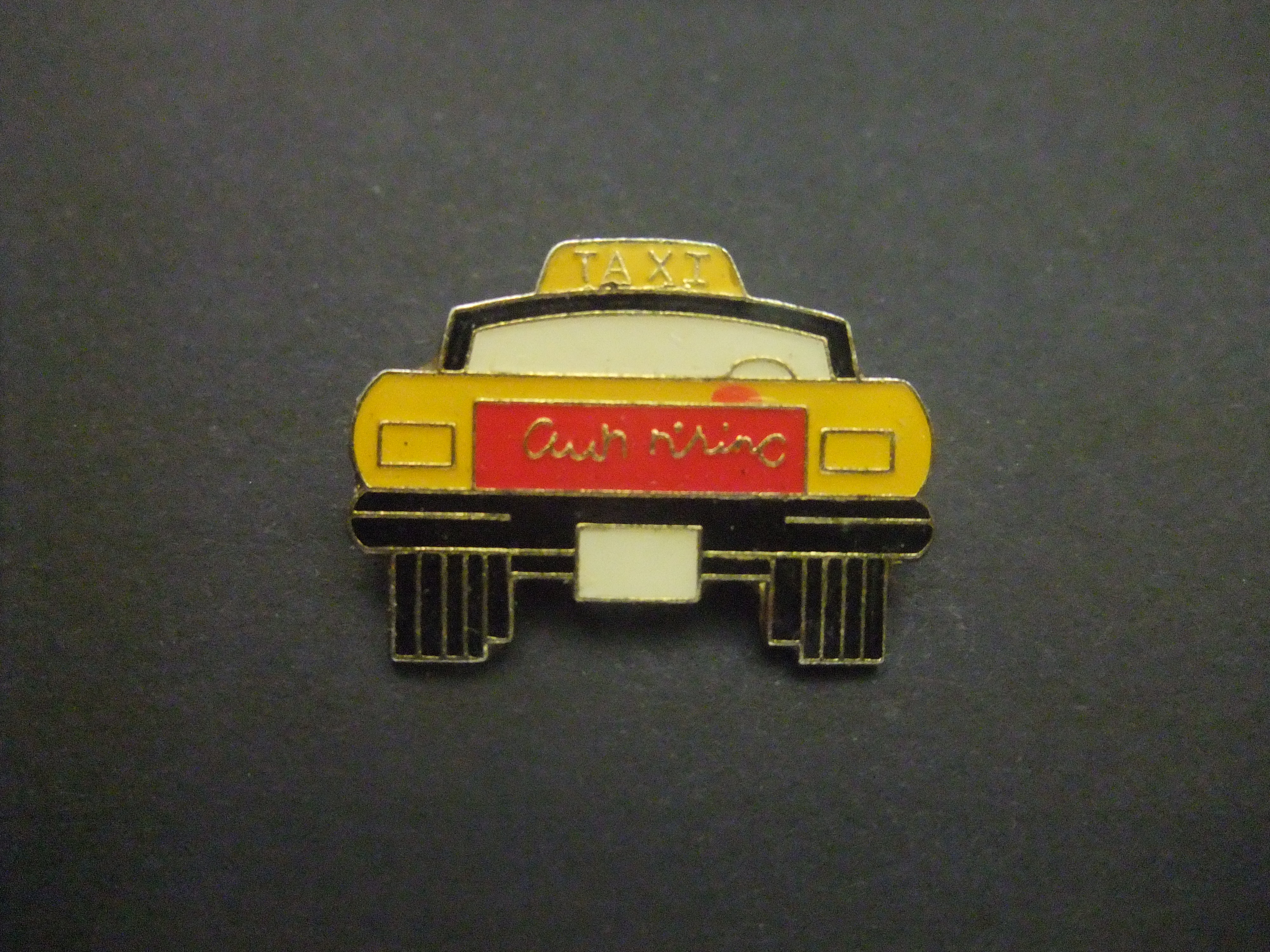 Taxi (achterkant ) rood-geel